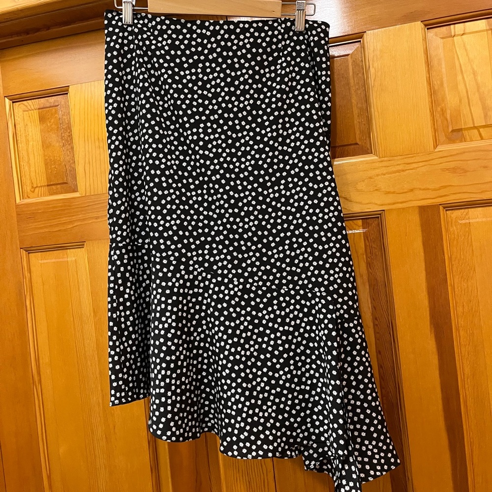 Black and white floral skirt with asymmetrical flounce by LUSH
